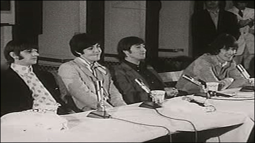 The Beatles face the press in Chicago