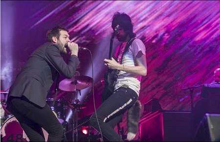 Tom Meighan and Serge Pizzorno with Kasabian live at the Leeds First Direct Arena (Photo: Gary Mather for Live4ever)