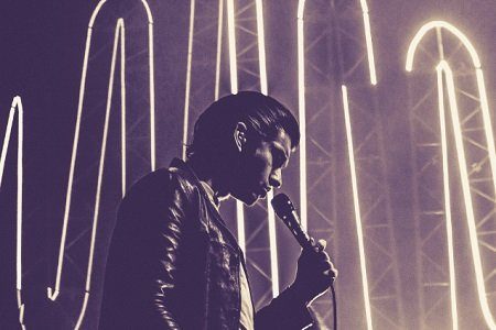 The Last Shadow Puppets' Alex Turner on stage with the Arctic Monkeys (Photo: Todd Howe for Live4ever Media)