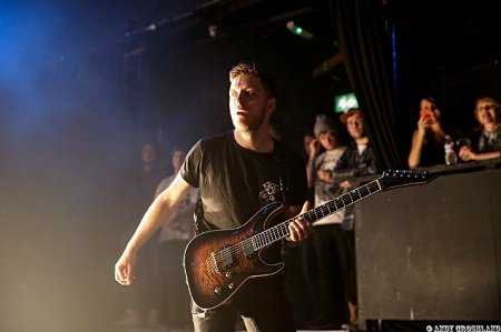 Tom Searle in concert with Architects in March 2014 (Photo: Andy Crossland for Live4ever)