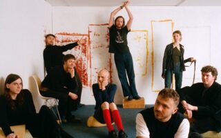 A photo of the band caroline