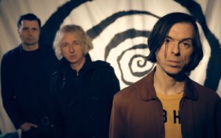 A photo of the band little barrie